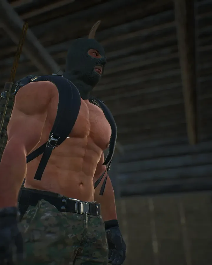 A Neverland survivor in a balaclava, shirtless and muscular, with a backpack and a bow, inside a wooden barn